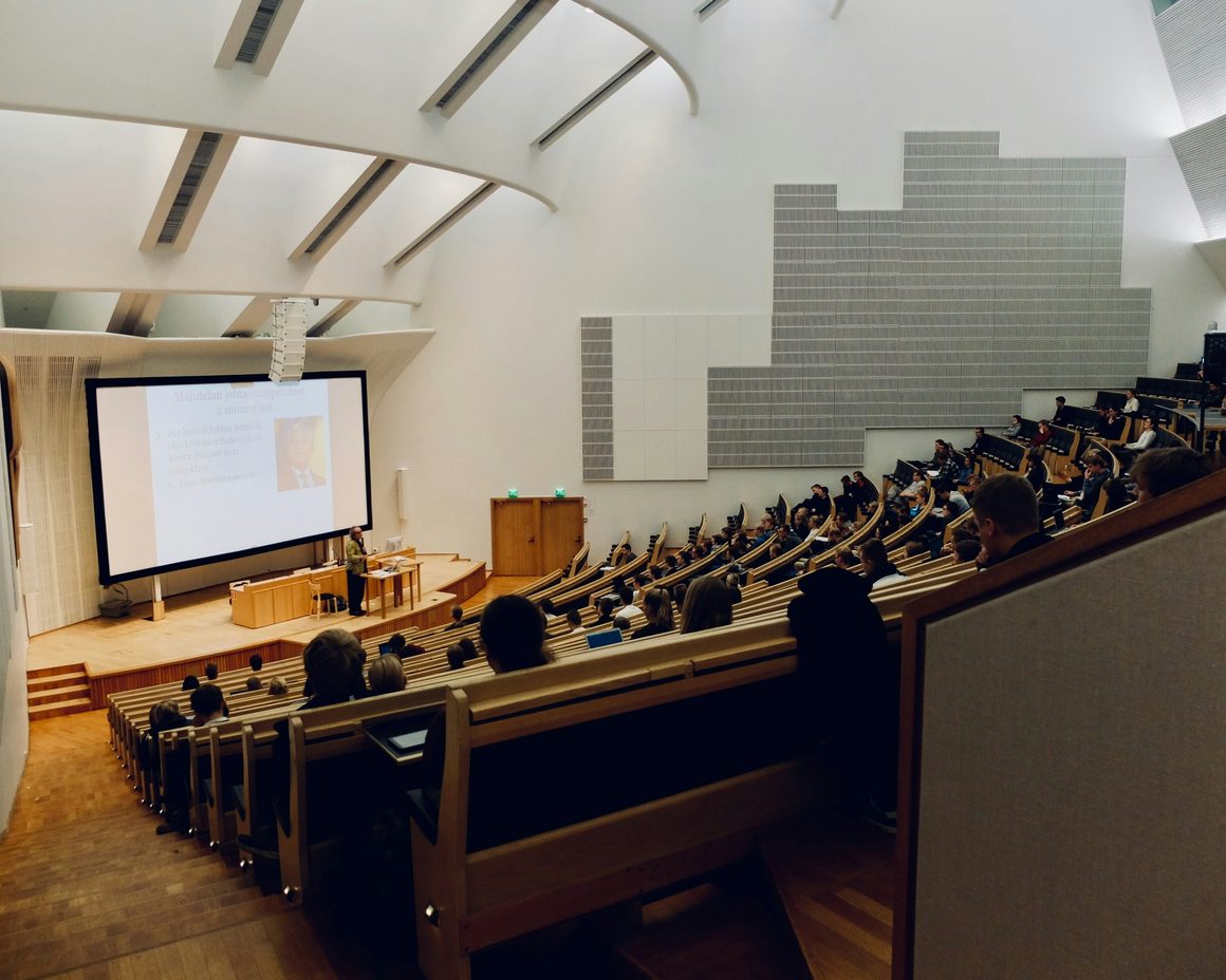 Students seated in a university lecture hall